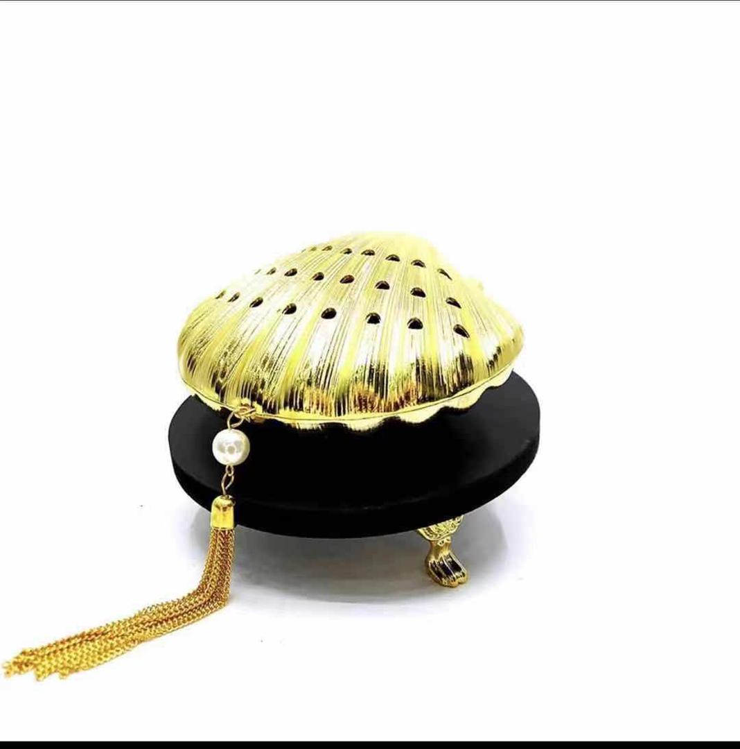 مبخرة شكل صدفة البحر