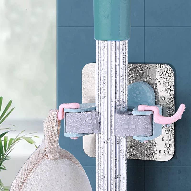 ستاند مكنسة جدار لاصق مع تعليقة