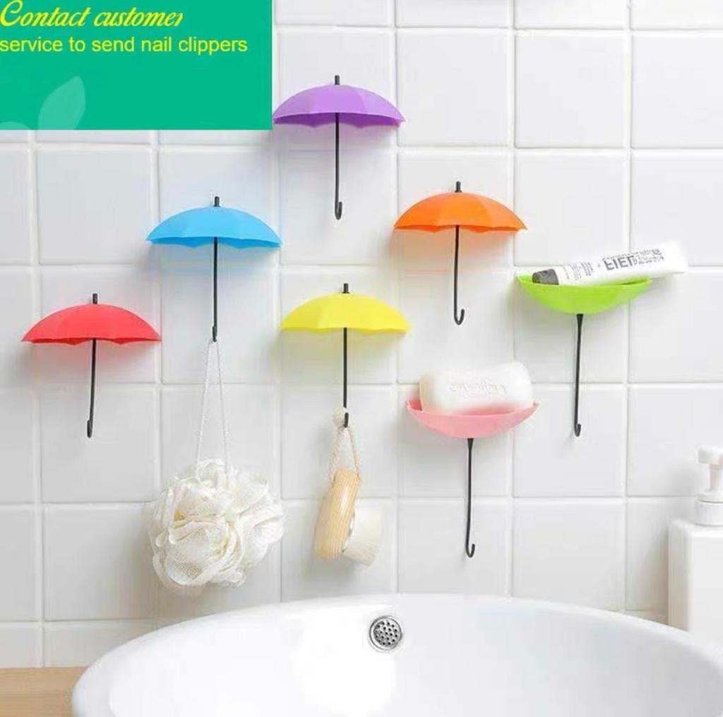 علاقي جدار لاصق شكل مضلة*3 حبات